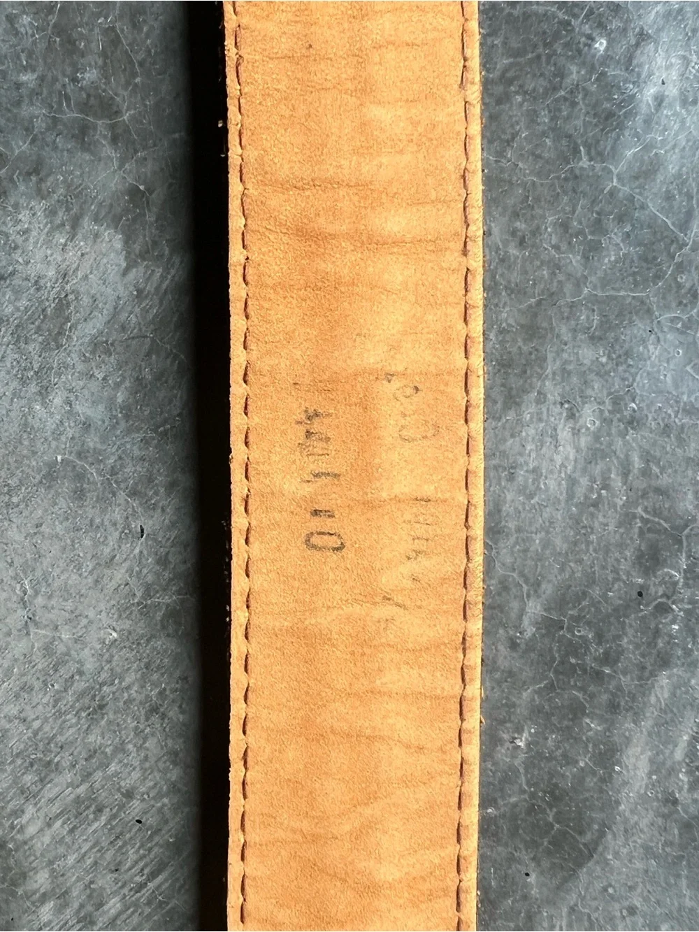 Vintage Levi's black tooled leather western belt with rotating harness buckle